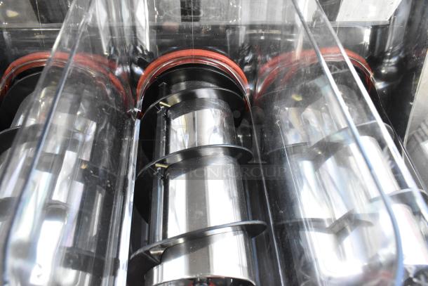 Narvon NSSM3 Summit triple 3.2-gallon granita machine, clear chambers, visible augers, excellent condition. 115V, 1 phase.