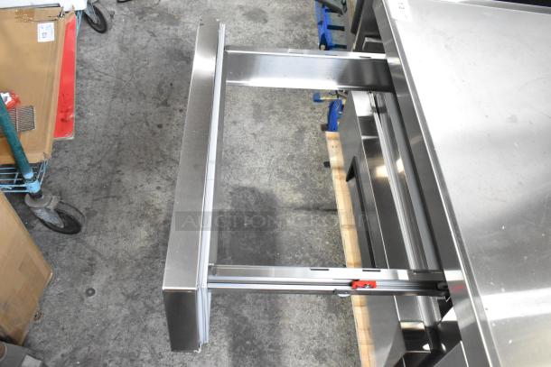 Brand new Avantco 178CBE72HC stainless steel 4-drawer chef base, 115V, showing an open drawer.