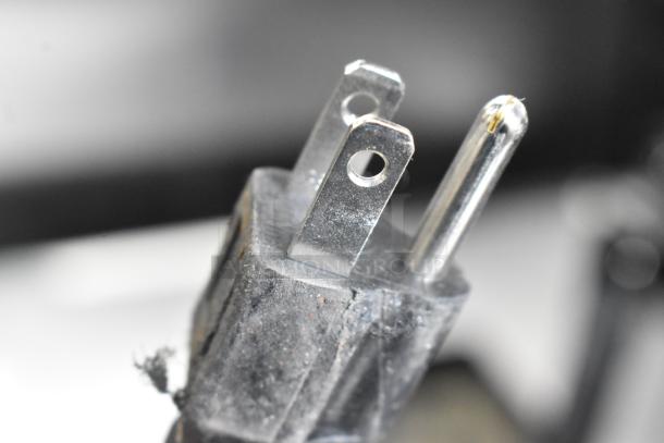 Close-up of a standard power plug for the Avantco 178CBE72HC commercial chef base.
