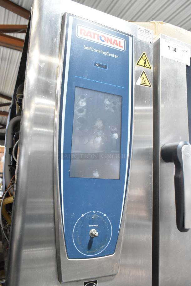 Rational SCCWE62/SCCWE100 iCombiPro convection oven, stainless steel, electric, visible wear, broken bottom door glass.