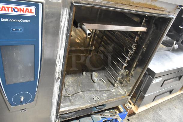 Rational SCCWE62 SelfCooking Center Convection Oven, stainless steel, electric, visible wear, open door shows interior.