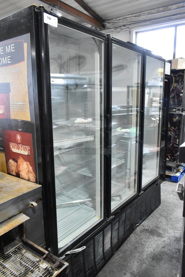Master-Bilt BLG-74HD commercial 3-door freezer merchandiser, metal, polycoated racks, 208-230V, 1 phase, good condition.