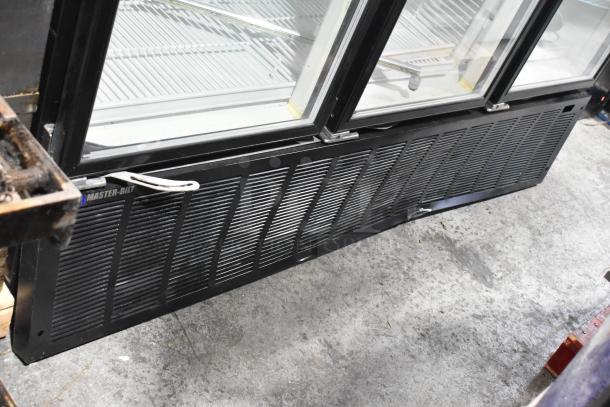 Master-Bilt BLG-74HD metal commercial 3-door freezer, poly-coated racks, 208-230V, 1 phase, excellent condition.