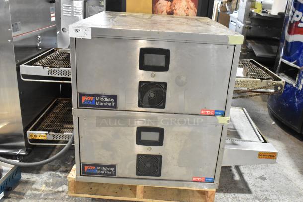 2021 Middleby Marshall DZ33T stainless steel conveyor pizza ovens on casters, electric-powered, model labels visible.