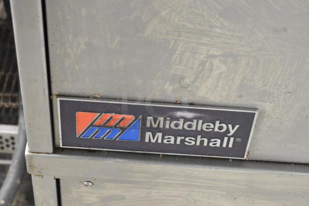 Middleby Marshall logo on a stainless steel DZ33T commercial electric conveyor pizza oven.