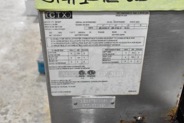 Middleby Marshall CTX DZ33T conveyor pizza ovens, stainless steel, 208 V, 3/1 phase, on casters, serial number visible.