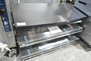 BRAND NEW ServIt 423OAM138D 48" heated display merchandiser, slanted, 2 shelves, 120V, minor dents.