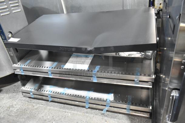 Brand new ServIt 423OAM138D 48" slanted 2-shelf heated display merchandiser with minor dents, 120V, 1 phase.