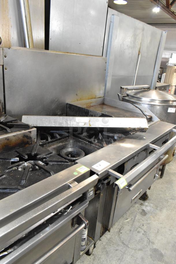 Vulcan V2BG4TS stainless steel commercial griddle with 4 burner range, oven, and backsplash on casters; 50,000 BTU.