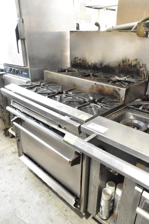 Stainless steel commercial gas griddle with 2-tier 6-burner range, oven, backsplash on casters, 50,000 BTU.