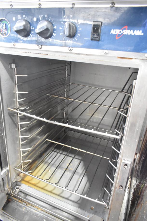 Alto Shaam 1000-TH/I stainless steel cook and hold oven, classic controls, commercial casters, 208-240V, 1 phase.