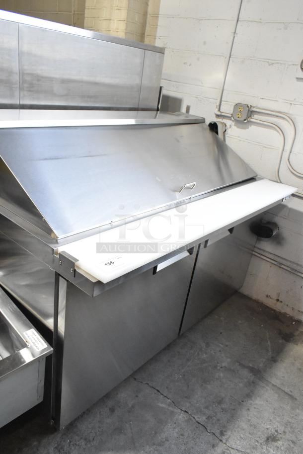 Avantco 178APT60MHC stainless steel sandwich prep table, scratch and dent, mega top, on casters, 115V, new condition.