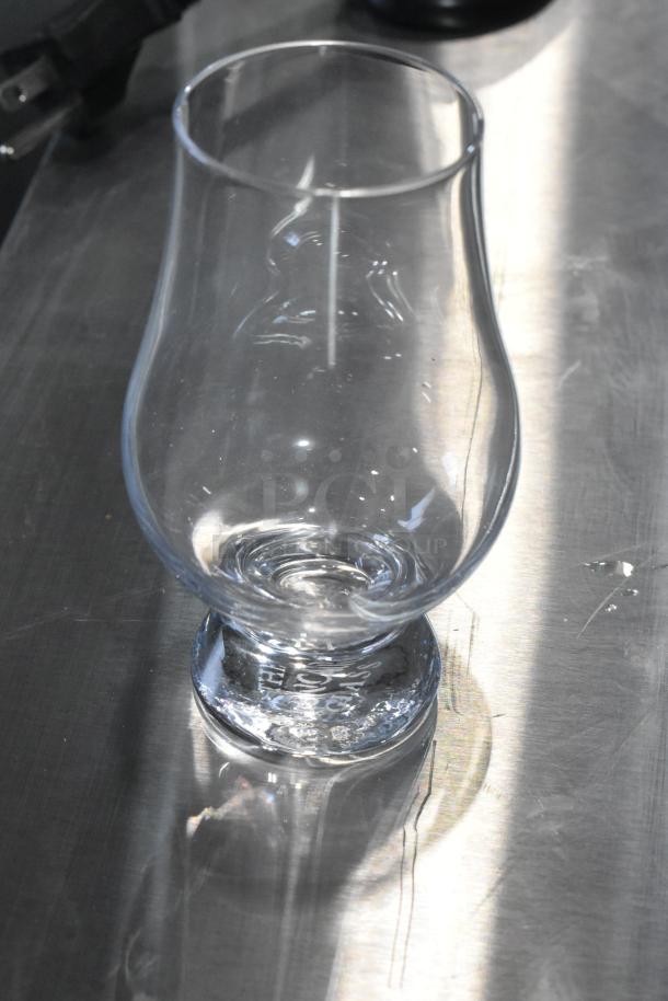 Stolzle Glencairn whiskey glass with noticeable scratch on base. New condition, part of tasting set with tray.