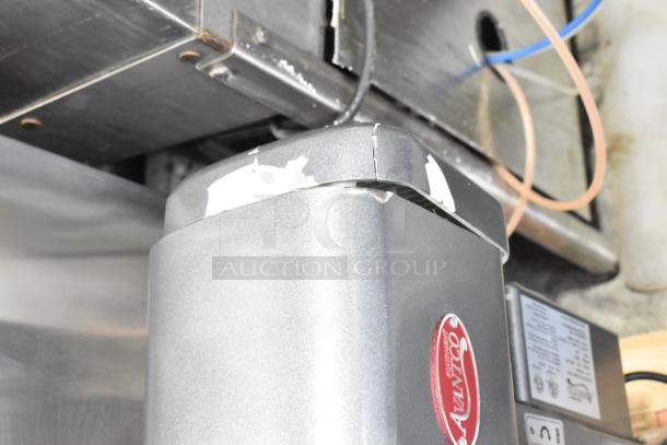 Brand new Avantco MX10H commercial mixer with metal mixing bowl and whisk. Minor scratches visible. 115V, 1 Phase.