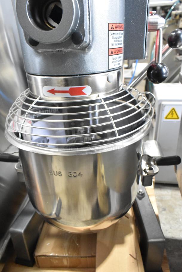 Brand new Avantco MX10H metal countertop mixer, 10 qt capacity, with bowl guard and whisk. Marked SUS 304, 115V, 1 phase.