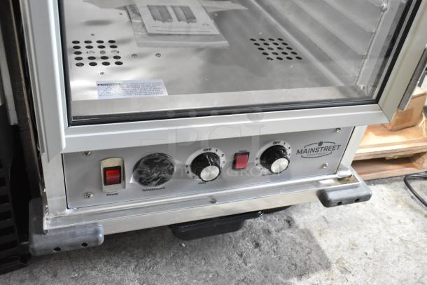 Mainstreet 541CHP1836I heated holding/proofing cabinet, new with minor dents. Clear door, commercial casters, 120V, 1 phase.