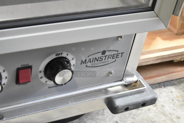 Mainstreet 541CHP1836I metal heated holding/proofing cabinet, clear door, commercial casters, 120V, brand logo visible.