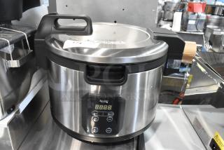 Brand new Avantco 177RCSB90 stainless steel digital electric rice cooker, 90 cup capacity, with hinged lid, 240V, 1 phase.