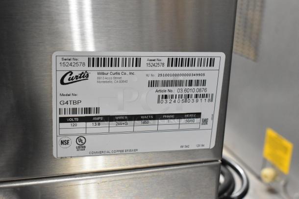Brand new Curtis G4TBP Polaris stainless steel 3-gallon tea brewer, scratch and dent condition, 120V, 1 Phase. Label shows model and serial number.