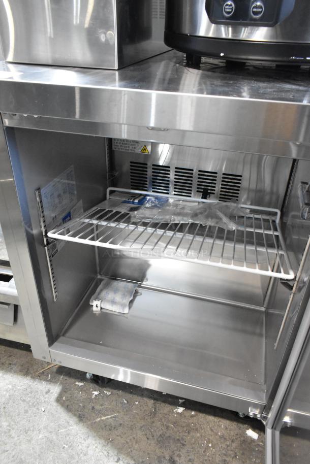 Brand new 2025 Avantco 178SSUC27RHC stainless steel undercounter cooler, single door, on casters. Scratch and dent model.
