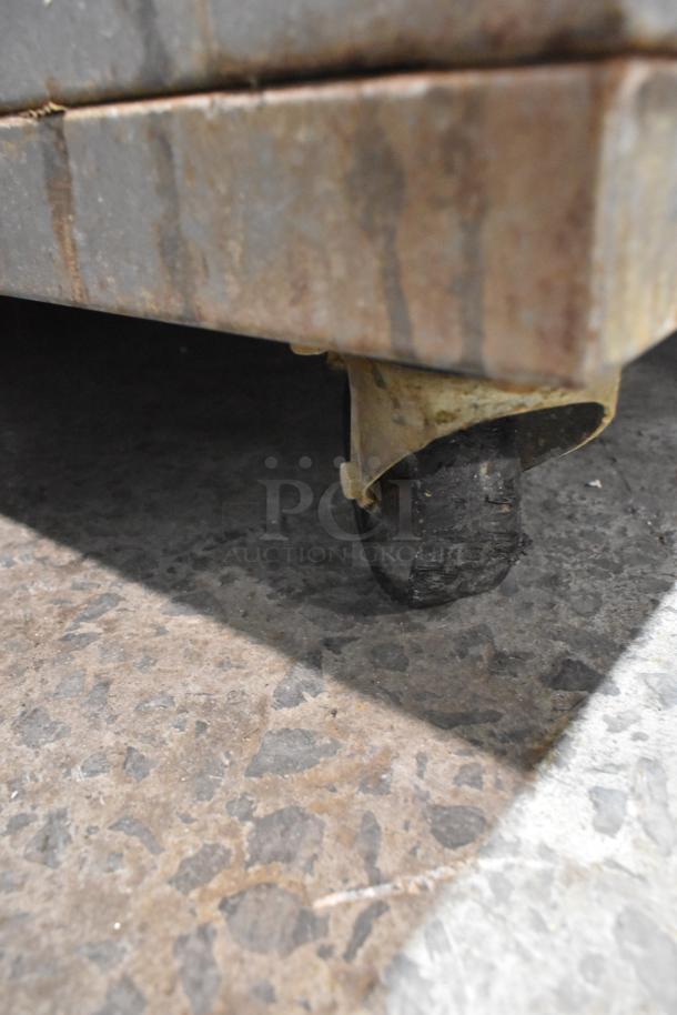 Mono FG180C-UZ56 combi oven, stainless steel, electric, under shelf, commercial casters, visible wear. 208V, 3 phase.