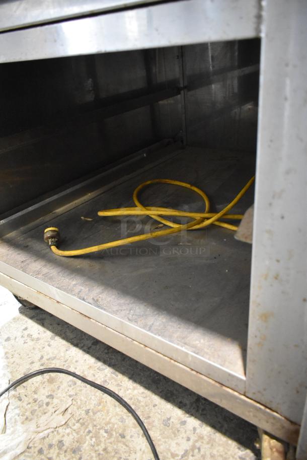 Mono FG180C-UZ52 BX Classic stainless steel commercial convection oven with undershelf on casters, electric, 208V, 3-phase.