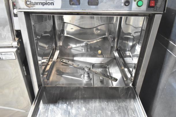Champion UB30B stainless steel undercounter dishwasher, commercial-grade, 120-208/230 volts, 1 phase, visible interior wash arms.