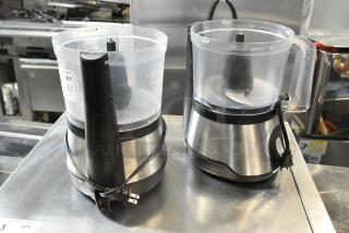 Two countertop food processors without lids, stainless steel base, 115 volts, 1 phase, cords attached.