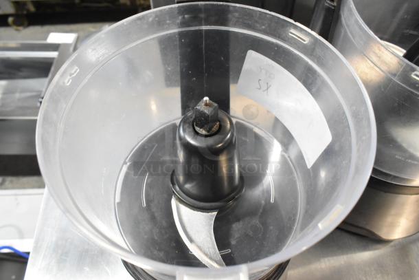Two countertop food processors without lids, featuring stainless steel blades, 115 volts, single phase. Auction includes two items per bid.