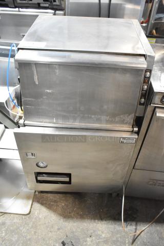 Stainless steel commercial undercounter glass washer, showing control panel with start and cycle buttons, in good condition.