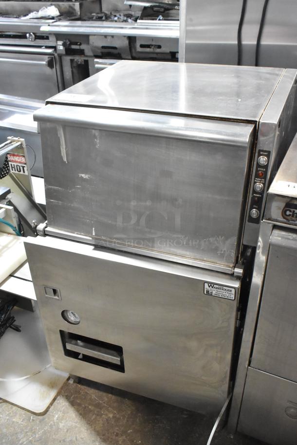 Stainless steel commercial undercounter glass washer with visible control panel and wear. Model: Warehouse 837-0511.