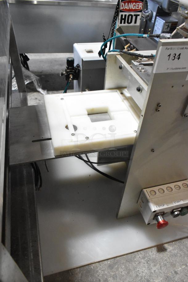 Package Metal Countertop Die Fold Wrapper Machine, industrial design, control panel with labels, used condition.