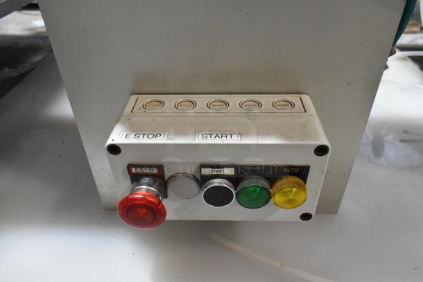 Package metal countertop die fold wrapper machine control panel, featuring labeled E-Stop, Start, Ready, Auto buttons.