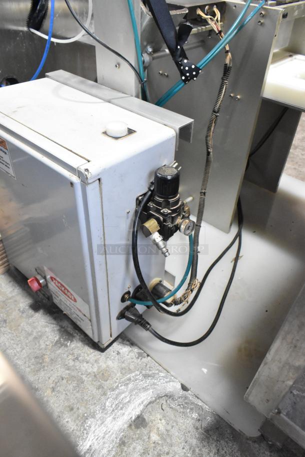 Package Metal Countertop Die Fold Wrapper Machine in used condition. Features control panel, visible wiring, and labeling.