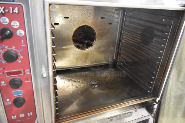 Blodgett BCX-14E stainless steel commercial electric combi convection oven, 208V, 3 phase, with control panel and pan rack, visible signs of use.