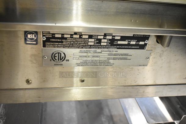 Blodgett BCX-14E stainless steel electric combi convection oven, 208V, 3-phase. ETL listed label visible, showing model and specs.