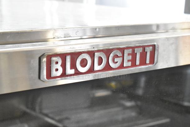 Blodgett BCX-14E stainless steel commercial electric combi convection oven. Visible Blodgett logo. 208 volts, 3 phase.