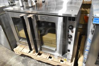 Brand new Cooking Performance Group FEC-100-D stainless steel commercial convection oven, scratch and dent, 240V, 1 phase.