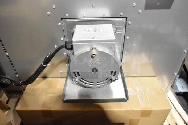 Stainless steel convection oven backside, model FEC-100-D, showing motor and power connection; marked as new, minor scratch and dent.