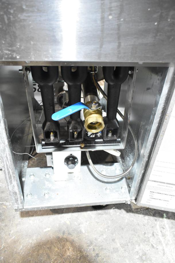 Hangzhou ENFF300L stainless steel commercial propane deep fryer, 90,000 BTU, shown on casters, featuring gas connection components.