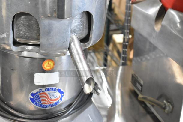 Stainless steel commercial countertop juicer, 115 volts, 1 phase, with USA manufacturing label; gently used condition.
