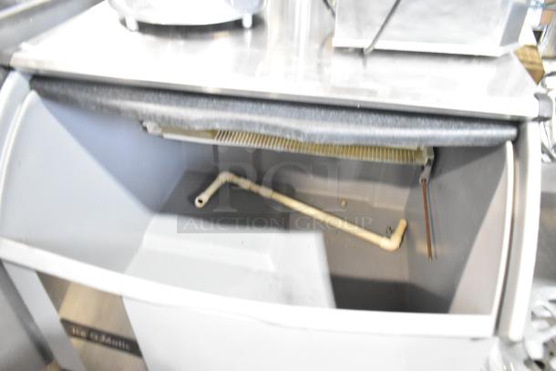 2021 Ice-O-Matic ICEU300HA6 commercial undercounter ice machine, metal, 115 volts, 1 phase, clean interior, visible piping.