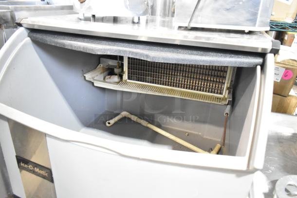 2021 Ice-O-Matic ICEU300HA6 commercial undercounter ice machine, 115V, 1 Phase, metal, minor signs of use, visible interior components.