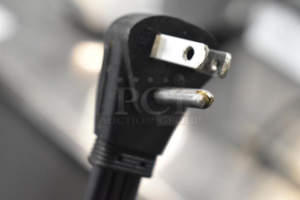 Close-up of a power plug for a 2021 Ice-O-Matic ICEU300HA6 commercial ice machine, 115 volts, 1 phase.