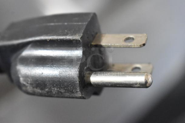 Power plug of Hoshizaki KM-501MWH commercial ice machine. 115-120 Volts, 1 Phase, showing wear.