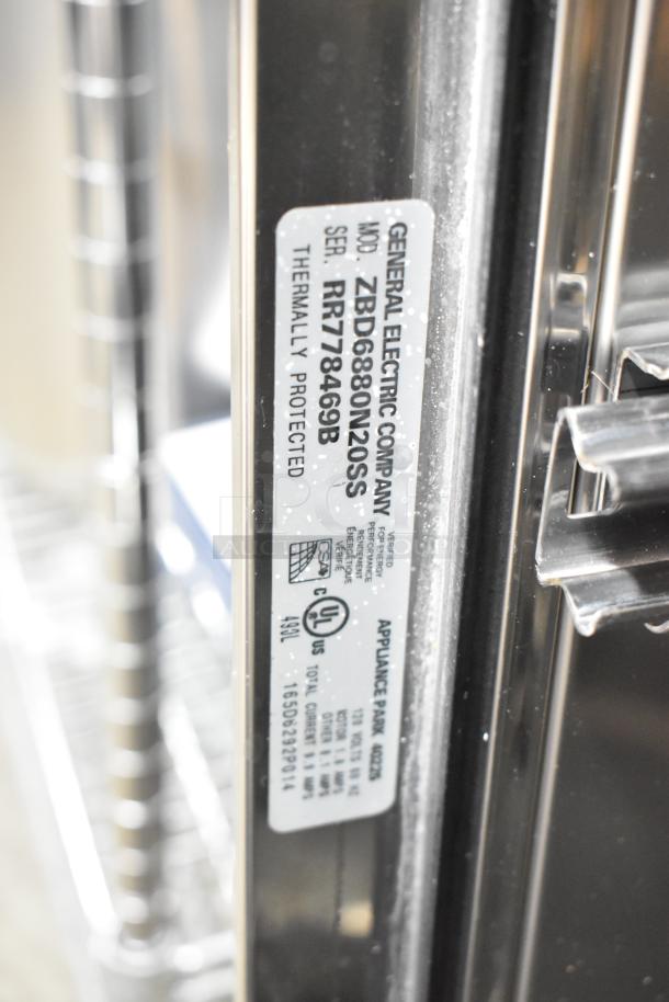 GE Monogram ZBD6880N20SS stainless steel dishwasher label, model and serial number visible, 115V, 1 phase.