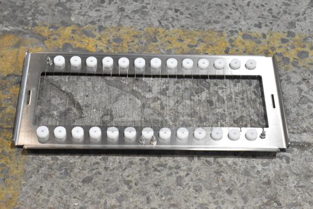 Steel cutter frame with white knobs, part of a scratch and dent auction. Includes Fenwal unit. Mint condition.