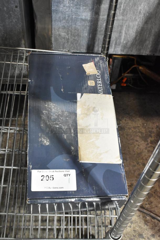 Boxed Waterloo 33.8 fl. oz. chrome soap dispenser, automatic, new with scratch and dent. Item number 205.