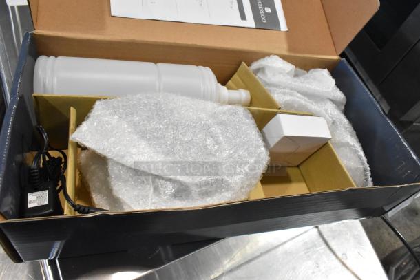 Brand new Waterloo 33.8 fl. oz. automatic deck-mounted squared chrome soap dispenser, boxed with liquid spout and power cord.