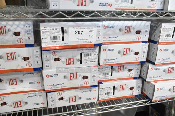 8 new LHQM LED R SD M6 Exit/Emergency Combo Signs in boxes on shelf; features dual voltage, 1.5W LEDs, NiCad battery.
